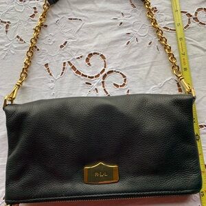 Ralph Lauren Black pebbled Leather
Bag/clutch excellent 10x11”open
Folded 6x10”